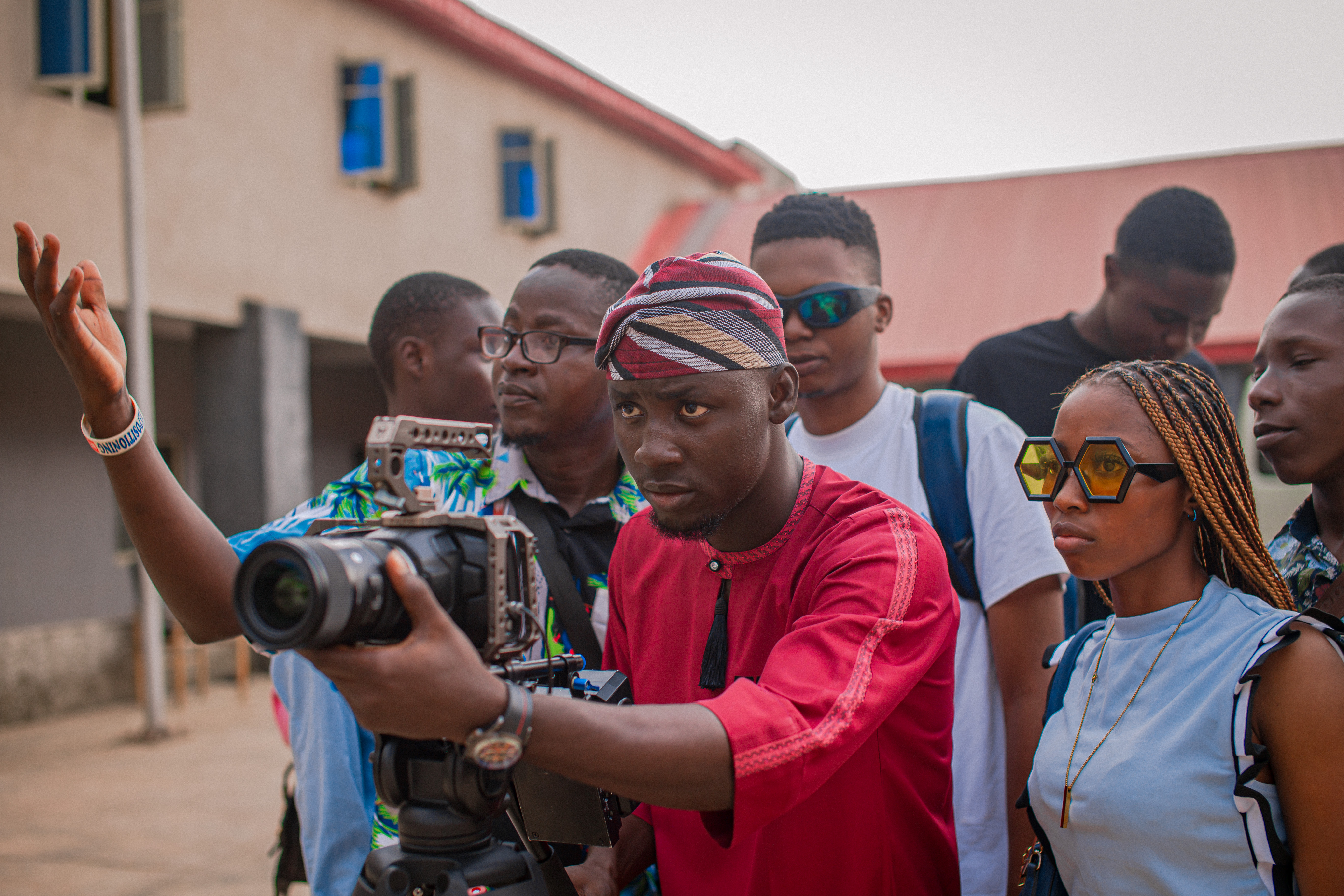 African storyteller filming a documentary